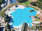 An aerial view of a pure crystalline lagoon powered by Crystal Lagoons technology called Blue Tree Phuket, in Thailand